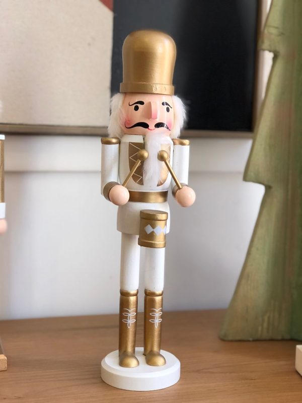 quebra noz Branco e dourado tambor